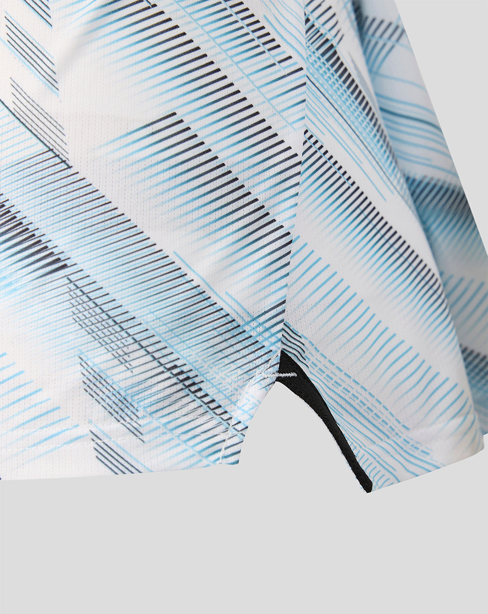 Close up of sleeve and fabric print on Feyenoord away shirt showing the blue pattern and stitching