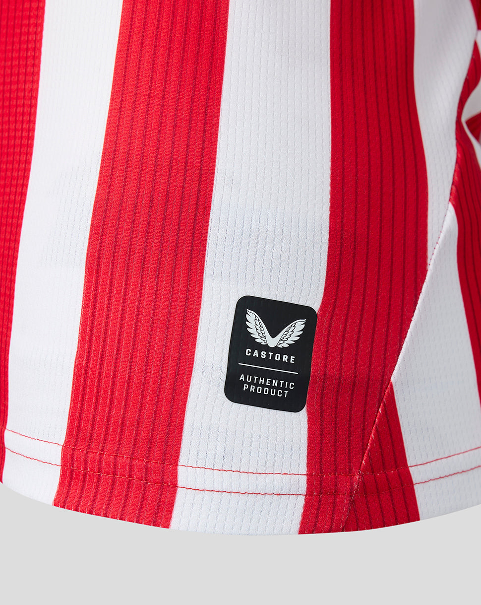 Bottom section of red and white striped Athletic Club shirt with Castore Authentic Product patch.