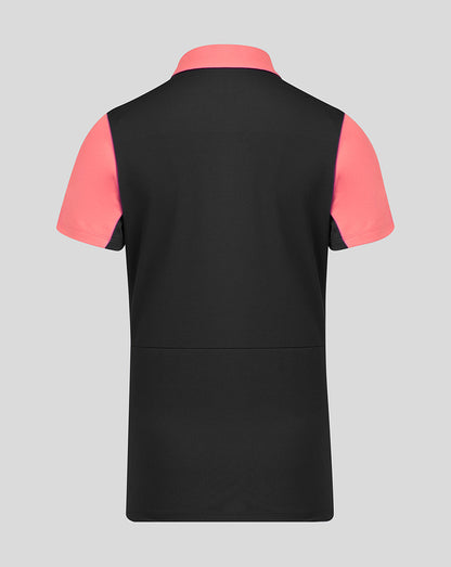Black t-shirt with pink sleeves on a gray background