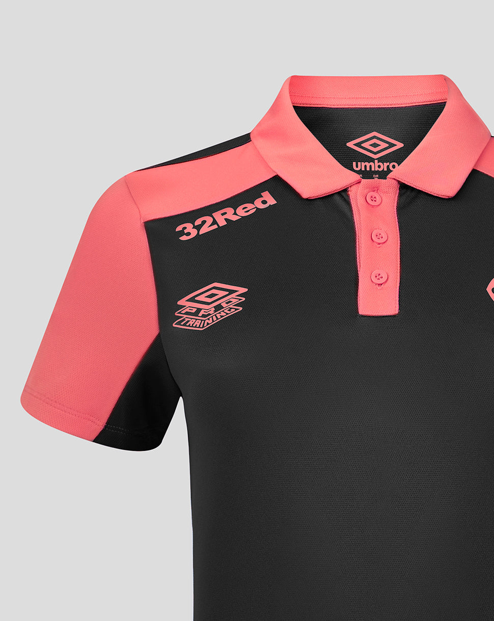 Black and pink polo shirt with '32Red' and Umbro logos on a gray background