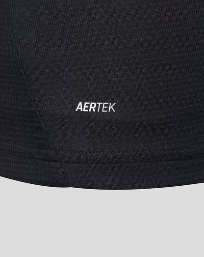Detail shot of black jersey fabric showing AERTEK branding near the hem