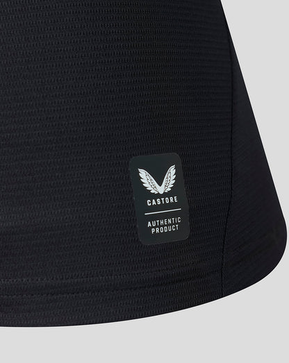 Close-up of black textured Athletic Club Away Shirt fabric with Castore authentic product badge