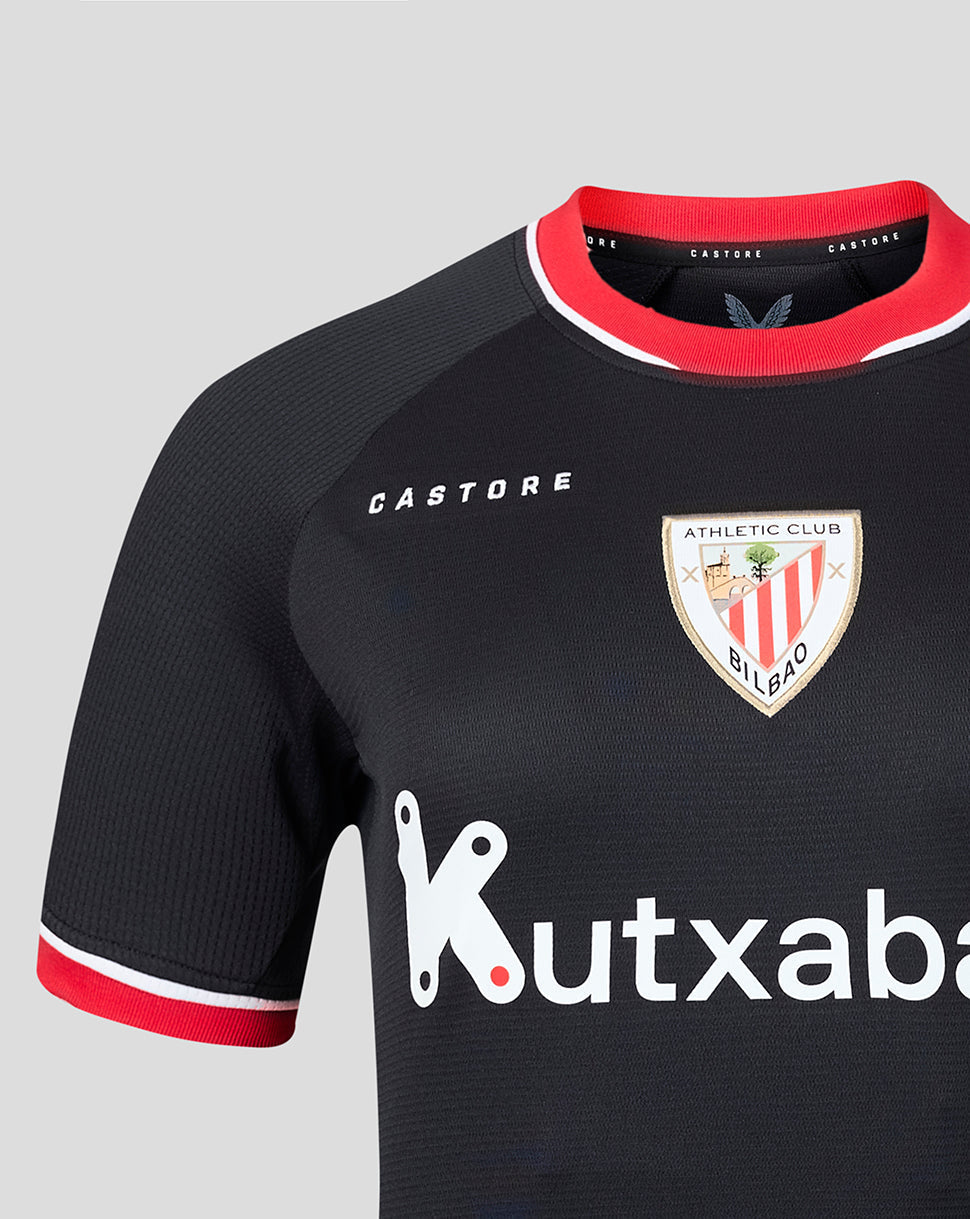 Close up of Athletic Club away jersey in black with red collar, crest on chest and Kutxabank sponsor across the front