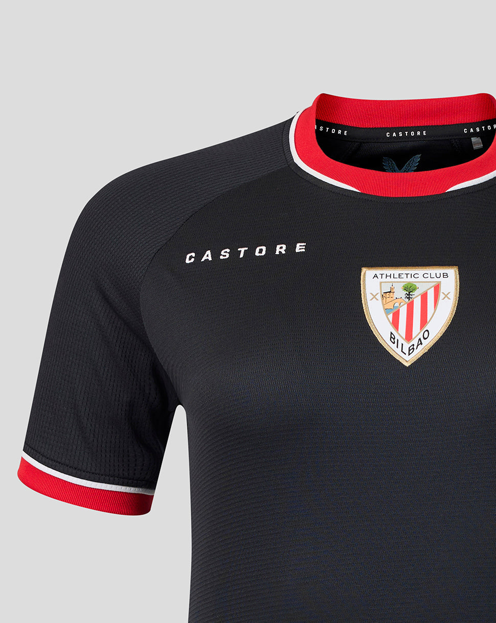 Close up of navy away shirt chest featuring Athletic Club Bilbao crest and Castore branding.