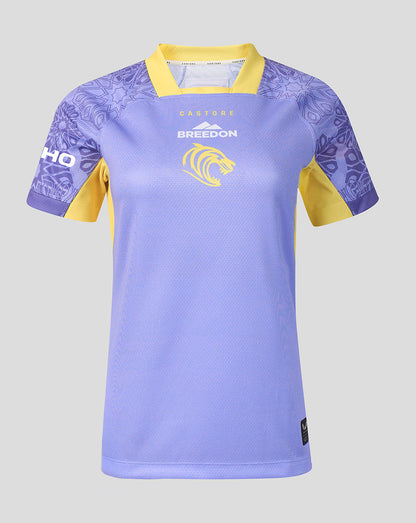 A light purple and yellow sports jersey with 'BREEDON' and a lion logo on the chest, and 'CASTORE' on the collar label.