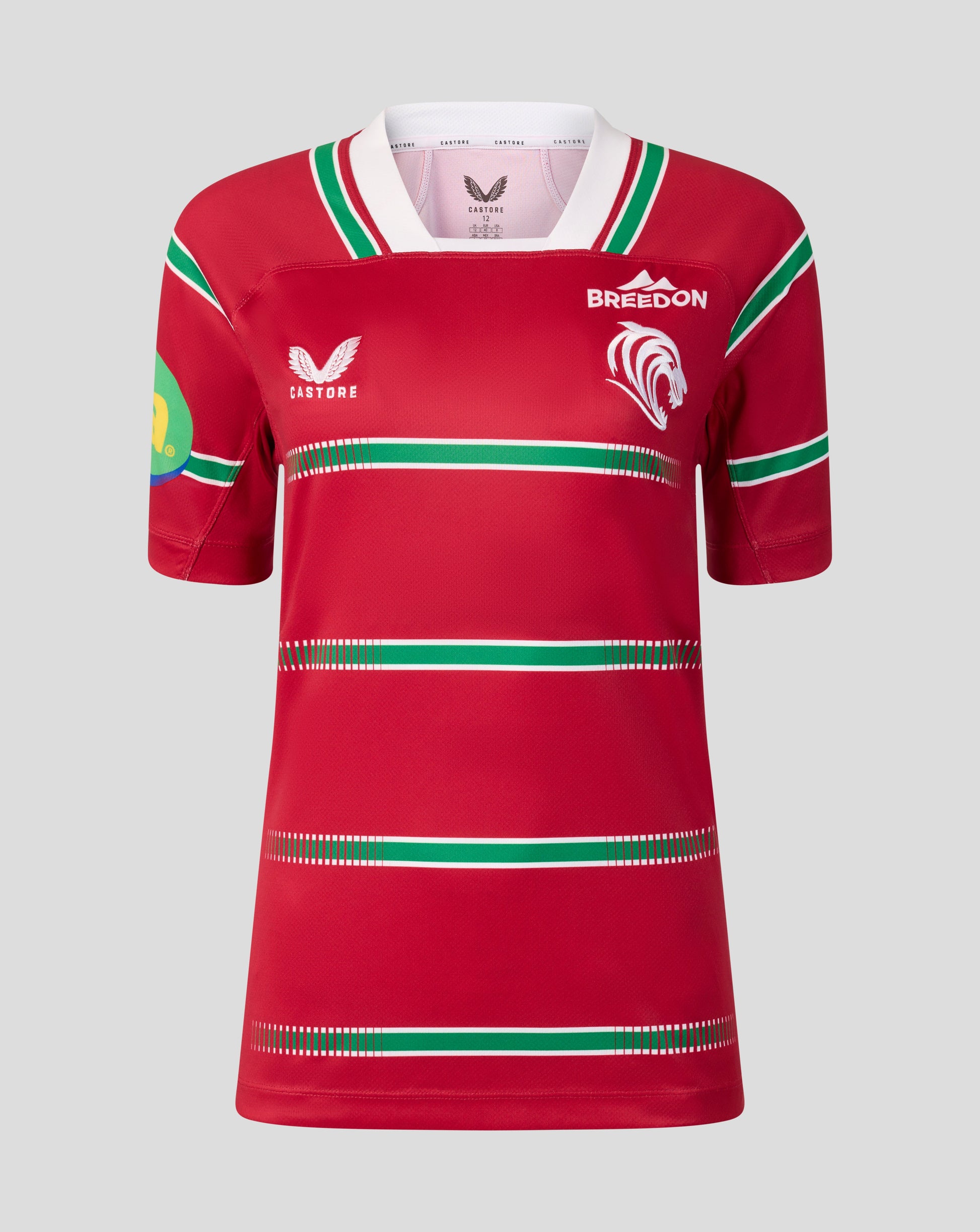 A red short-sleeve rugby jersey with green and white horizontal stripes, featuring the Bredon logo on the left chest, a white Castore logo on the right chest, and a green and yellow sleeve patch, shown against a solid gray background.