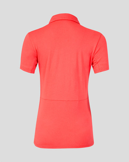 Red polo shirt on a gray background