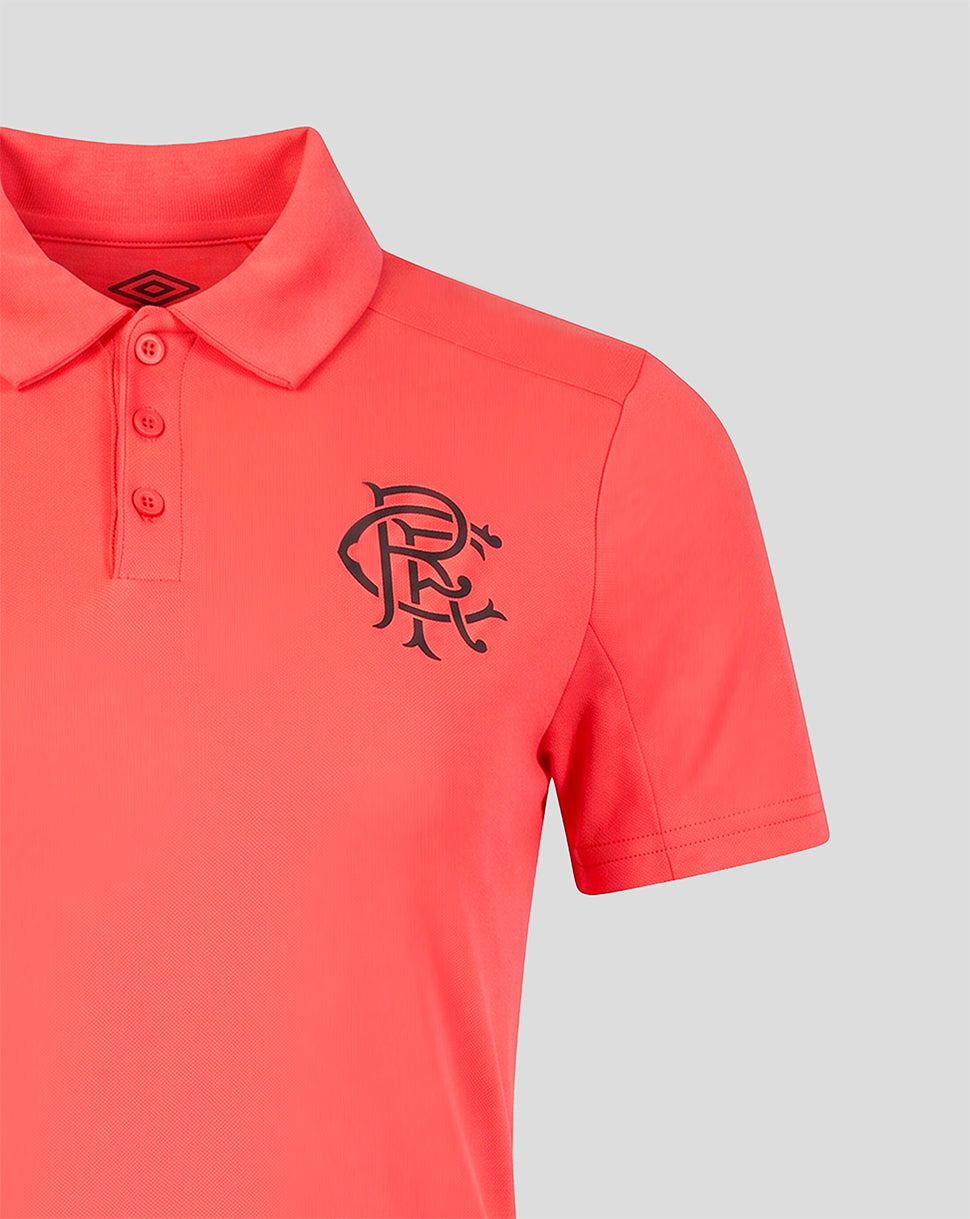 Red polo shirt with a black logo on a gray background