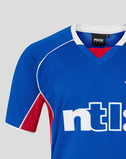 Blue sports jersey with red accents and 'nti' branding on a gray background
