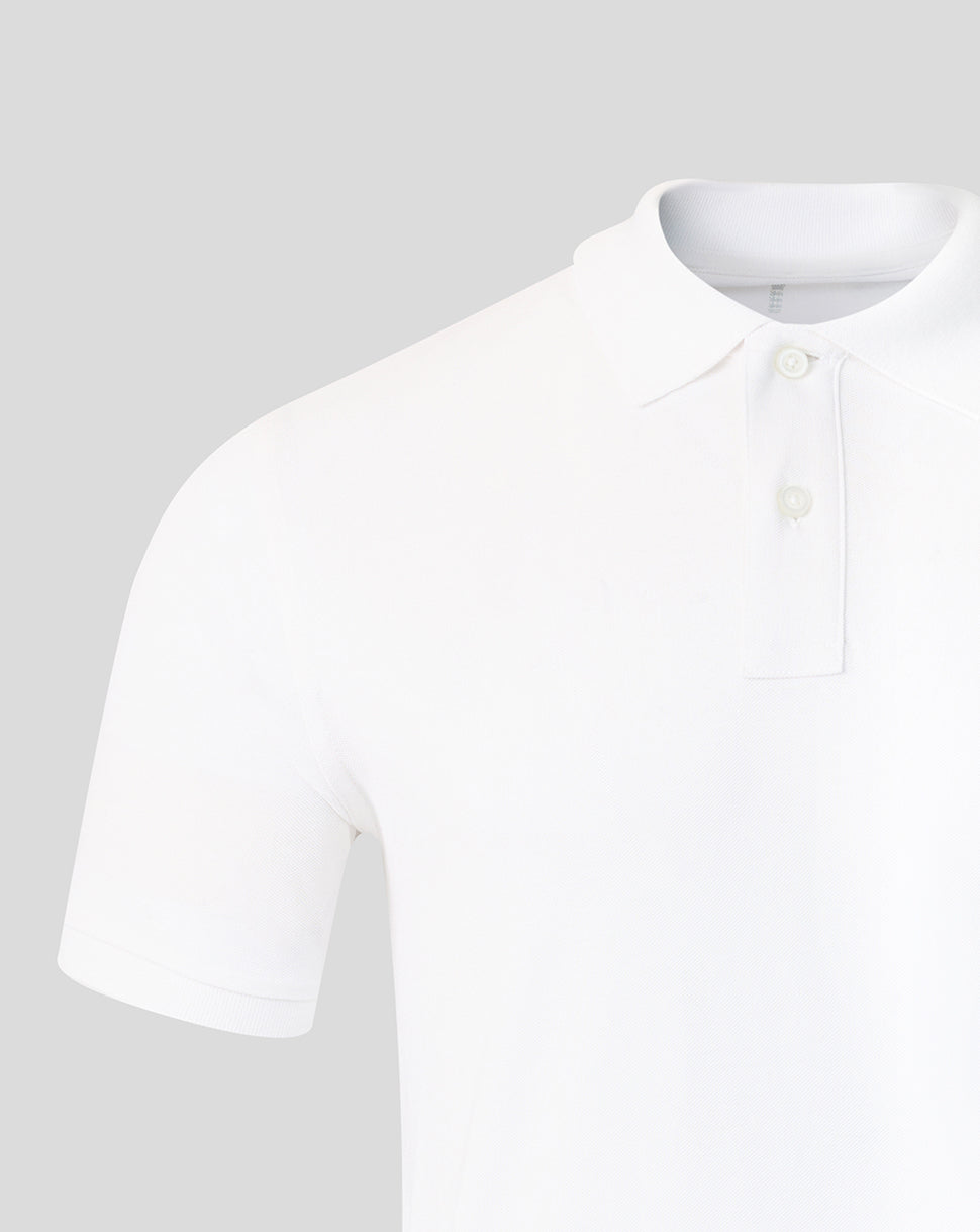 White polo shirt on a light gray background