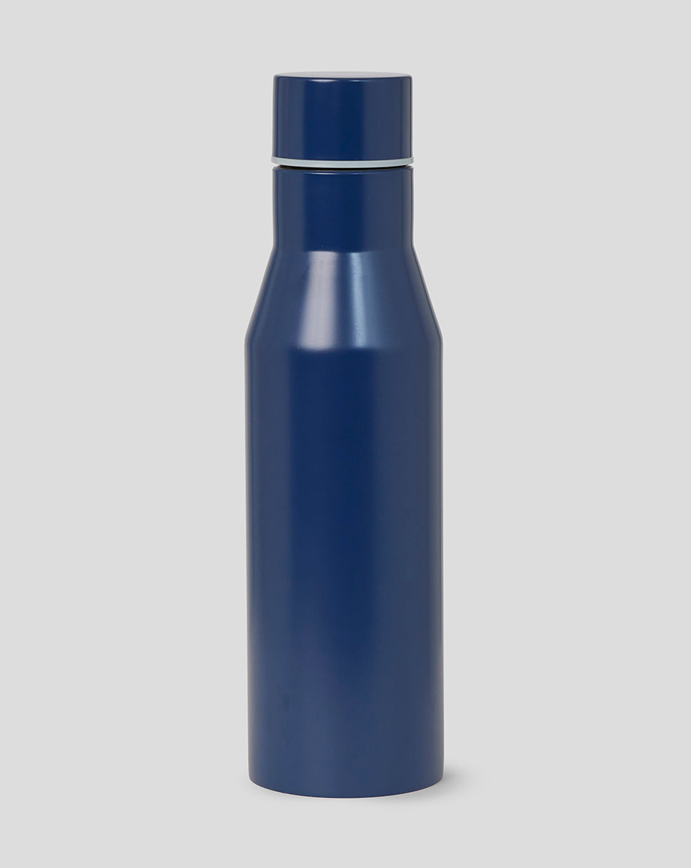 Blue water bottle on a light gray background