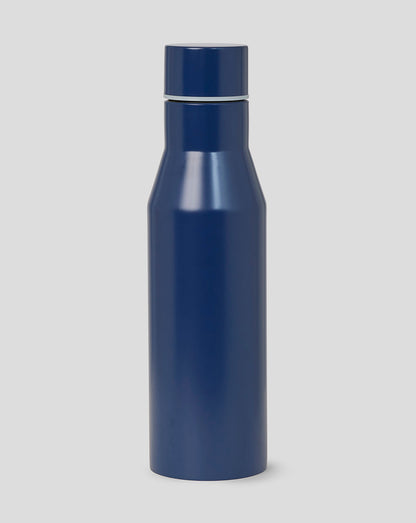 Blue water bottle on a light gray background