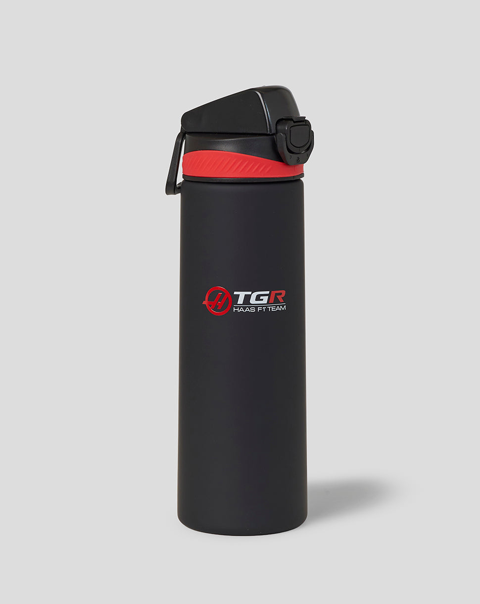 Black water bottle with red accent and TGR logo on a gray background