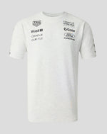 White t-shirt with multiple brand logos on a light gray background