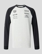 Black and white long-sleeve shirt with various brand logos on a gray background