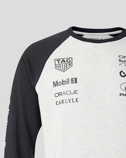 Black and white long-sleeve shirt with various brand logos on a light gray background