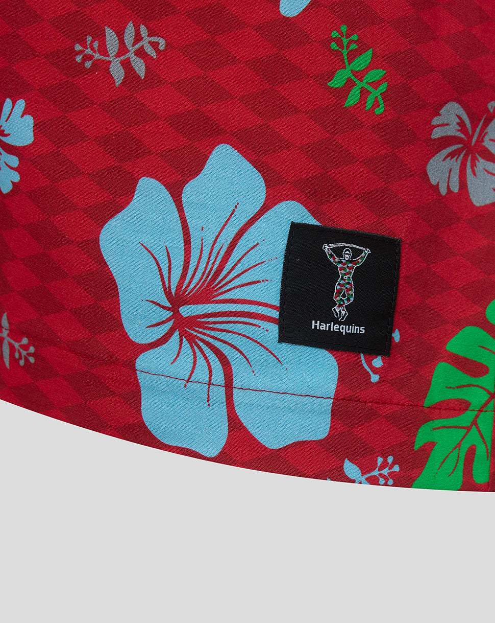 Red fabric with blue floral patterns and a Harlequins logo tag.