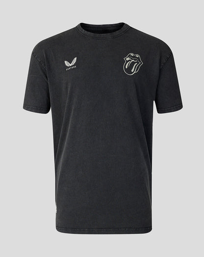 A washed black short-sleeve t-shirt featuring a white Rolling Stones tongue and lips logo on the left chest and a white Adidas logo on the right chest, displayed against a solid gray background.