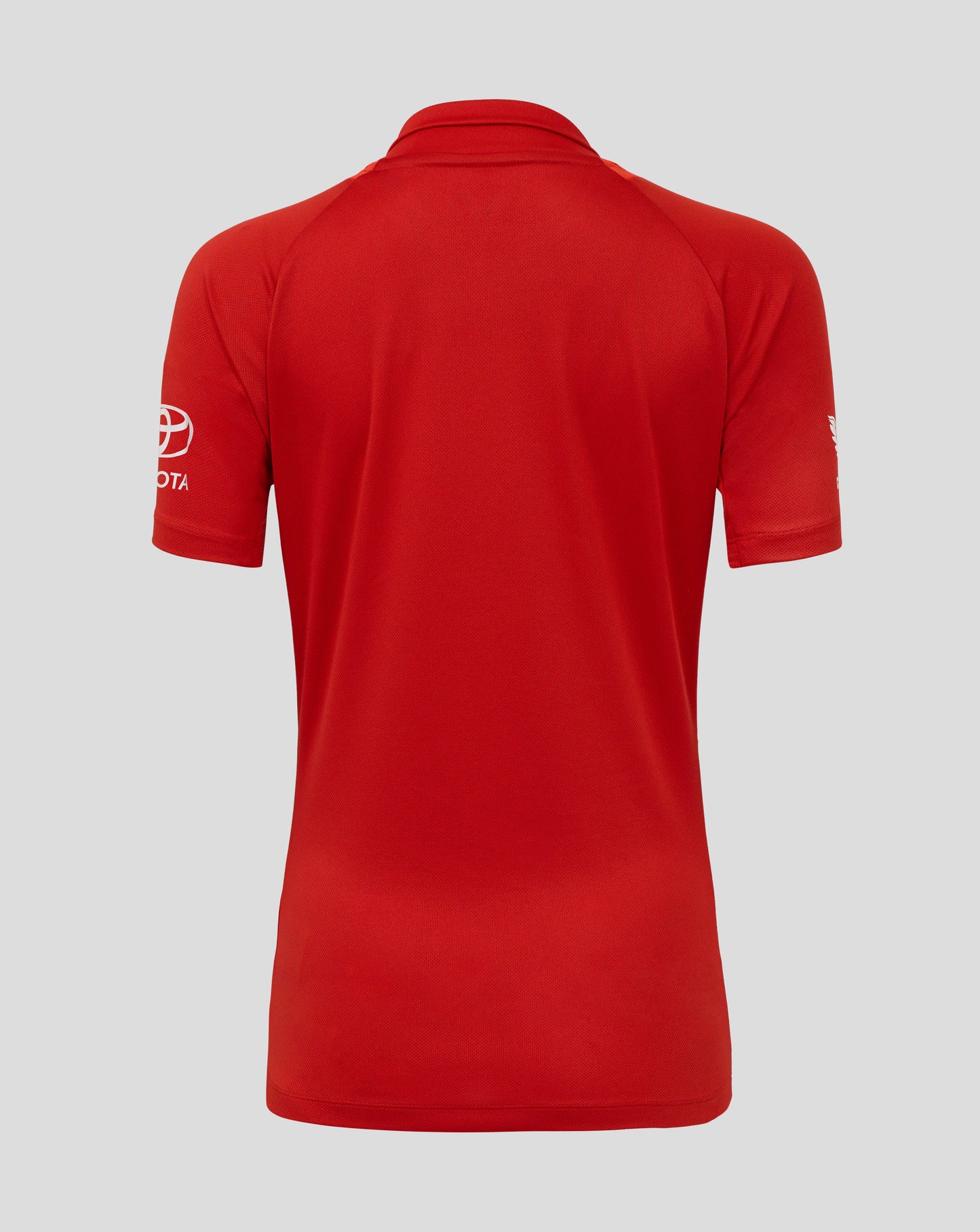 Red polo shirt with Toyota logo on a gray background