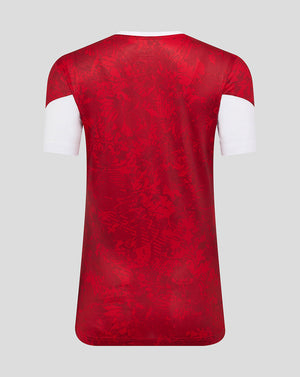 Back view of Athletic Club women's home shirt in red with white sleeve cuffs and subtle abstract print
