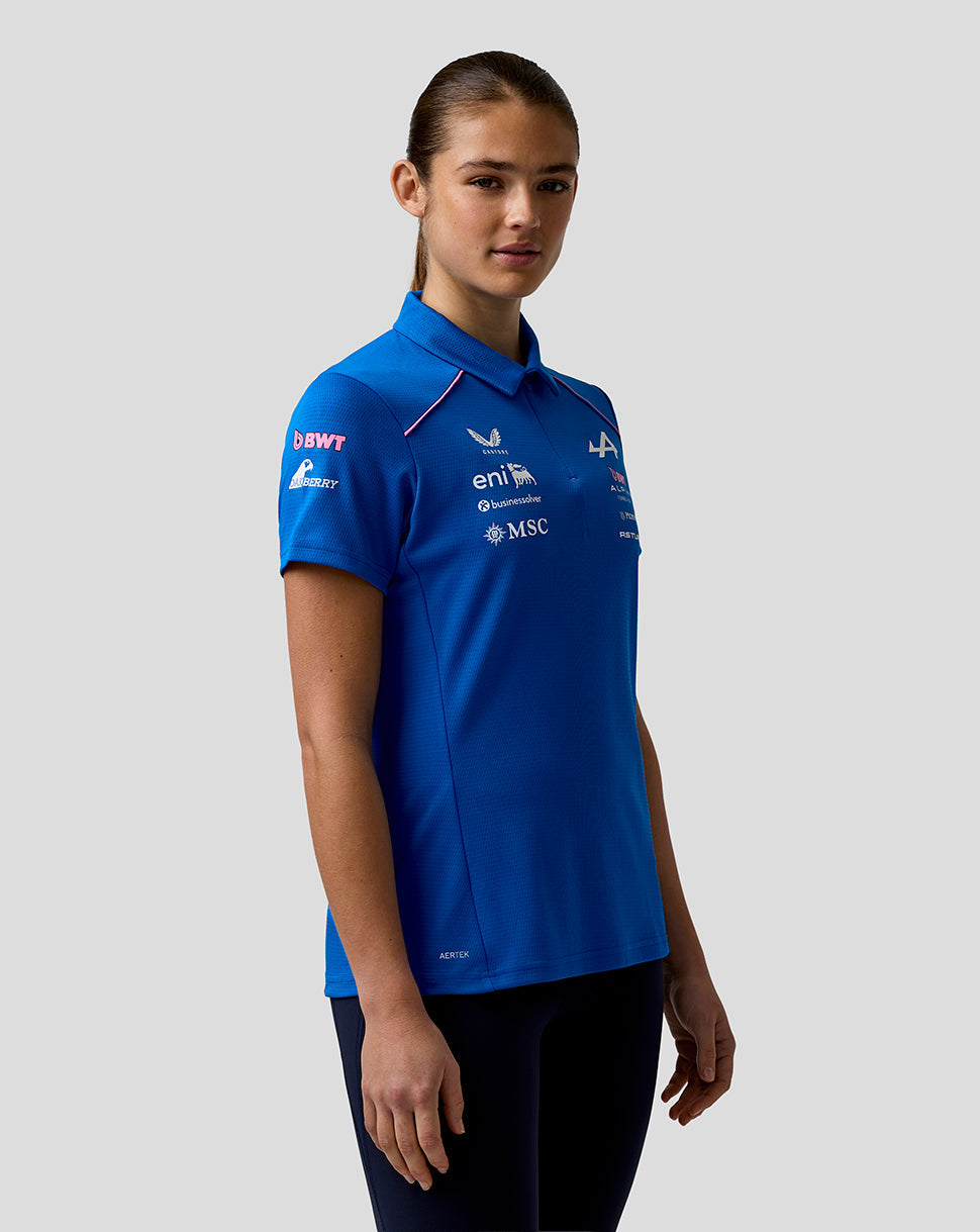 Front view of a model wearing the blue Official Women’s BWT Alpine Formula One Team Polo Shirt with sponsor logos on the chest