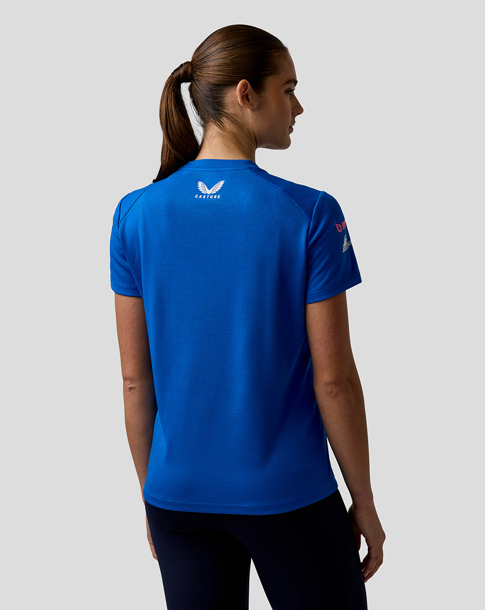 Model wearing blue BWT Alpine Set Up shirt shown from the back with a small logo at the upper back.