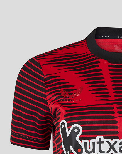 Front view of red and black striped Athletic Club shirt with crest on left chest and bold sponsor logo across midsection.