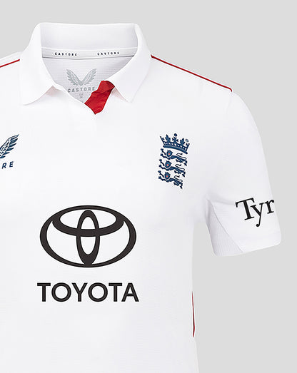 White sports jersey with Toyota logo and other branding on a gray background