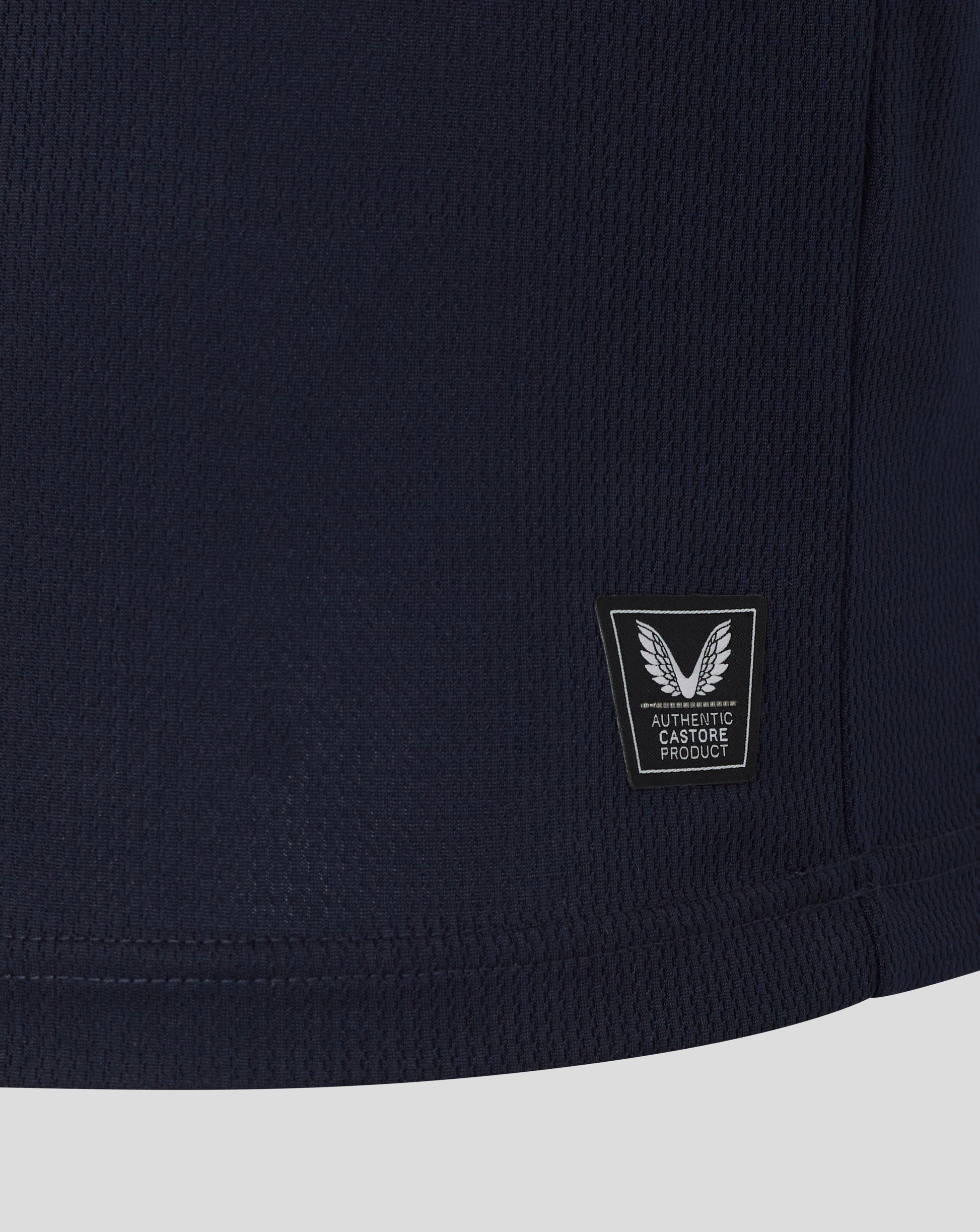 Navy blue fabric with a small logo on a white background
