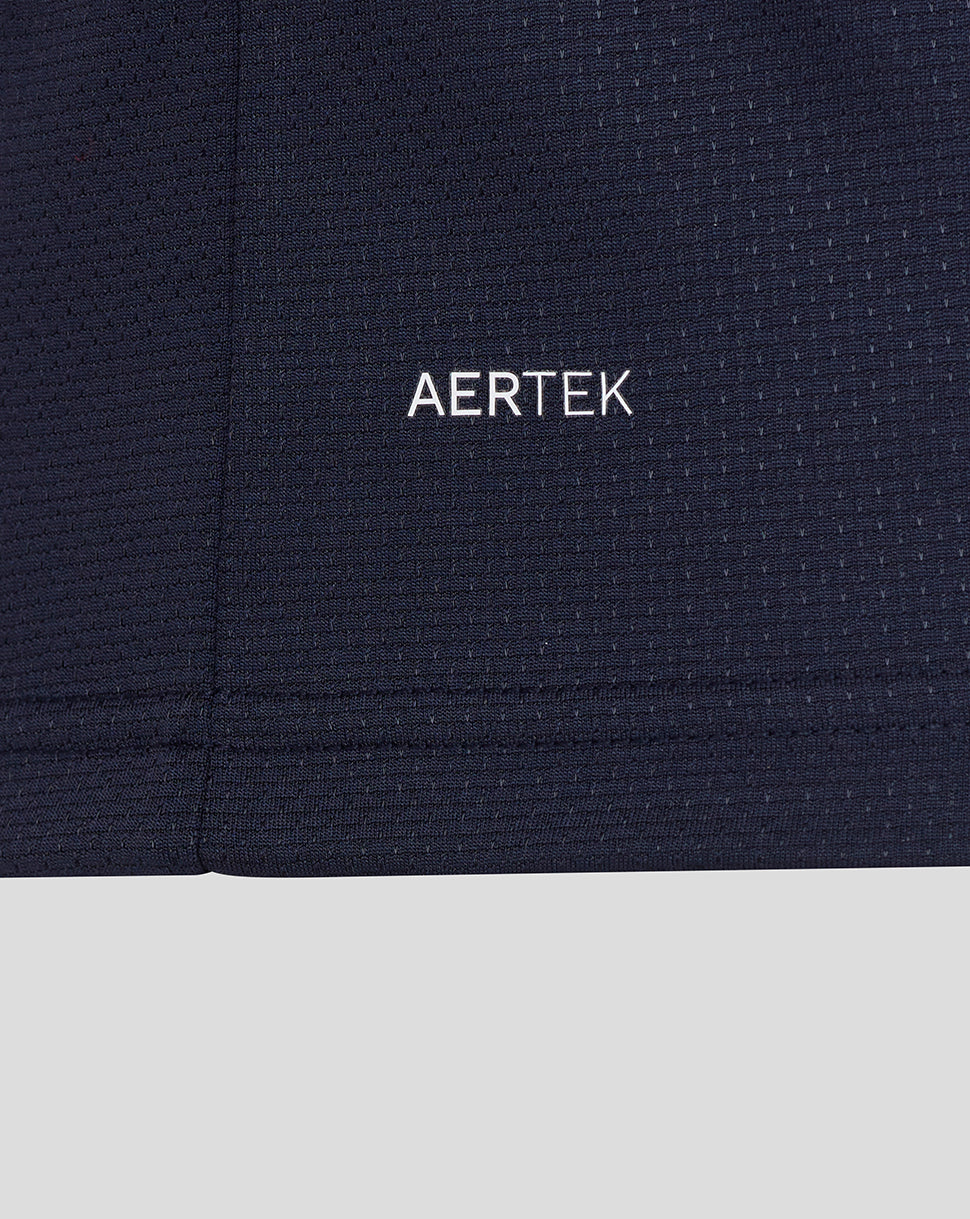 Navy fabric with 'AERTEK' logo on a close-up of clothing