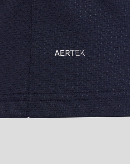 Navy fabric with 'AERTEK' logo on a close-up of clothing