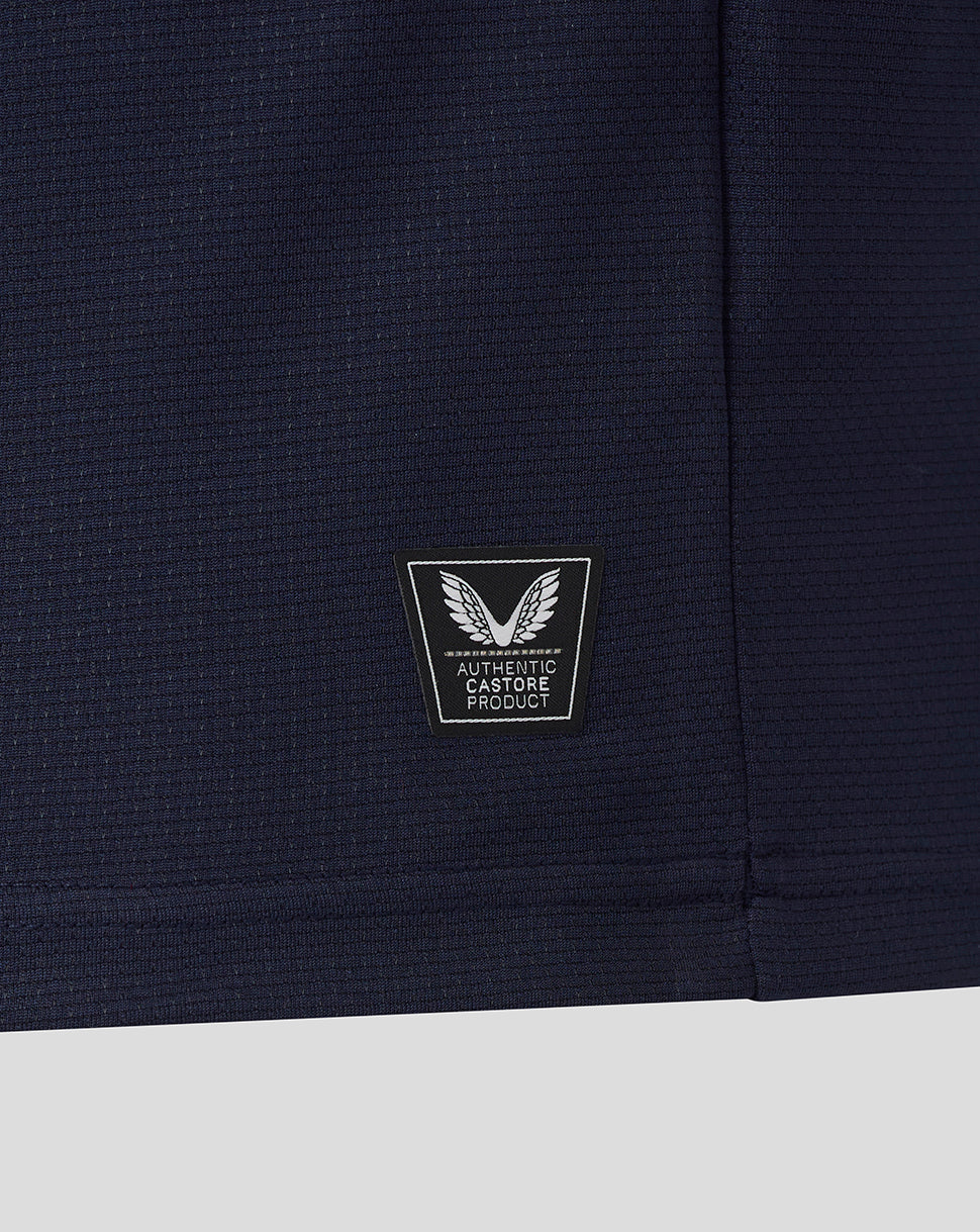 Navy blue fabric with a logo patch on a white background