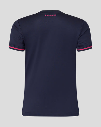 Navy blue t-shirt with pink accents on a gray background