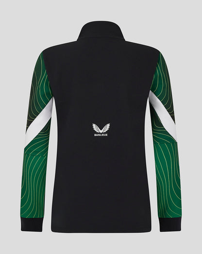 Back view of black Feyenoord women's 24/25 third matchday anthem jacket with green patterned sleeves and Banlieue logo on the lower back.