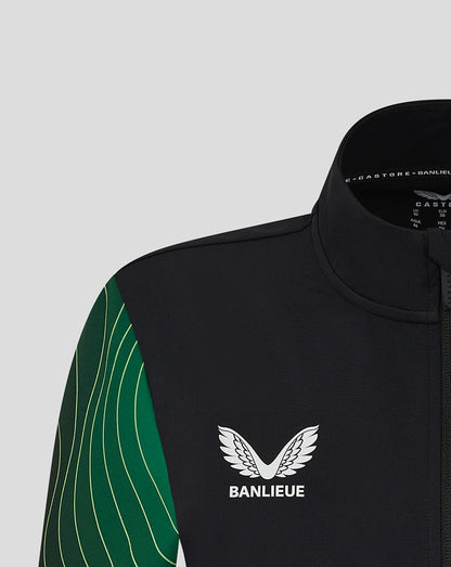 Close up of the chest shows the Banlieue emblem on black fabric with green patterned sleeves from the Feyenoord jacket.