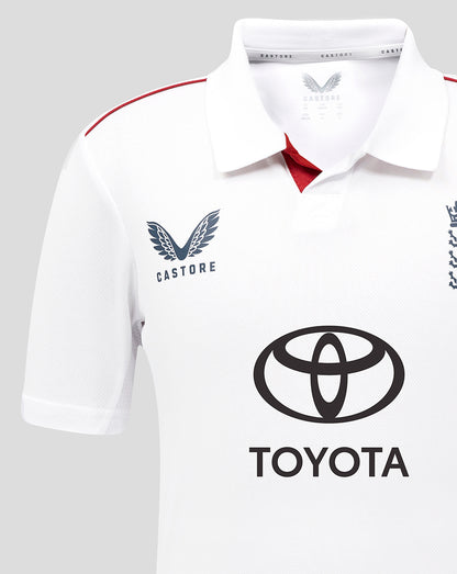 White polo shirt with Castore and Toyota logos on a gray background