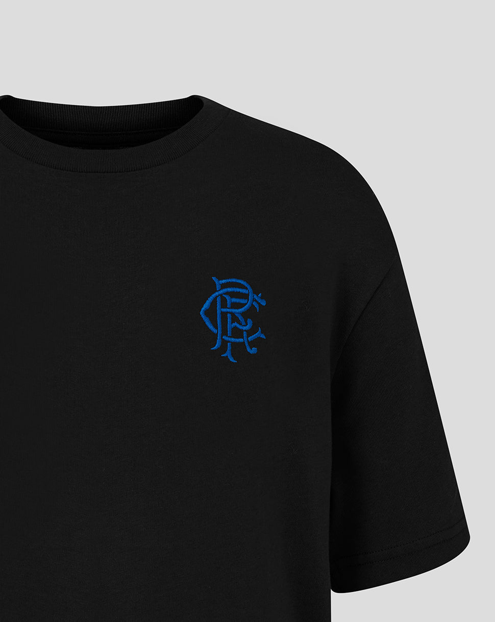 Close up of blue crest on the left chest of a black Rangers Junior Core Crest Tee