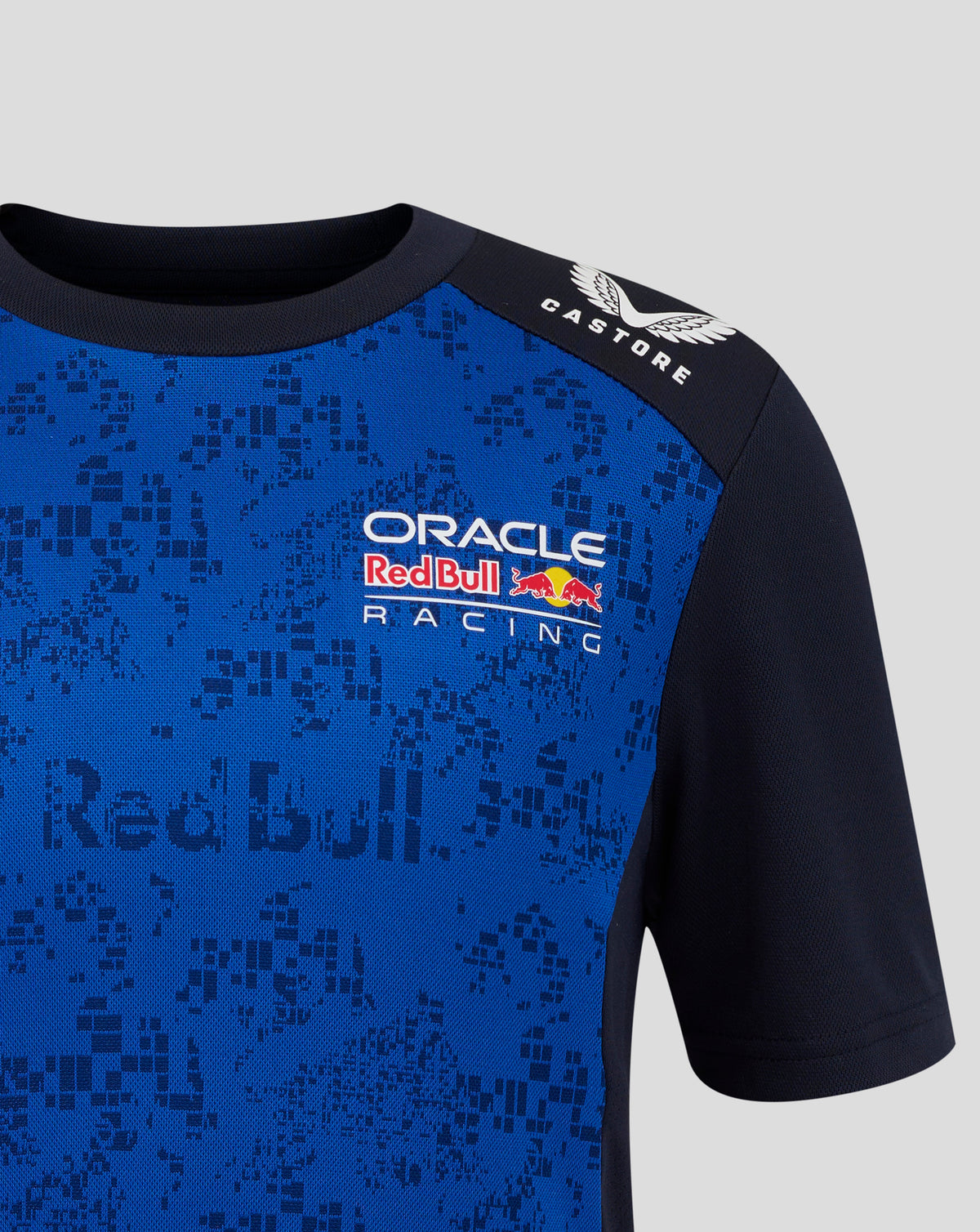Blue and black sports jersey with Oracle Red Bull Racing logo on a gray background