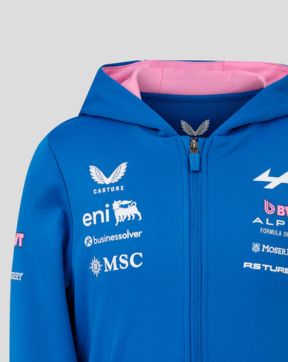 Upper front of blue zip hoodie shows many sponsor logos and pink inner hood lining