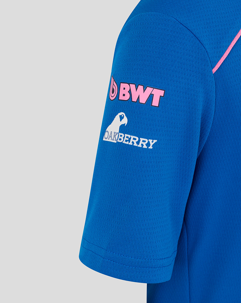 Blue junior BWT Alpine polo sleeve with pink BWT logo and Oakberry penguin sponsor.