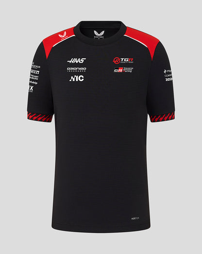 Black sports jersey with red accents and multiple brand logos on a gray background