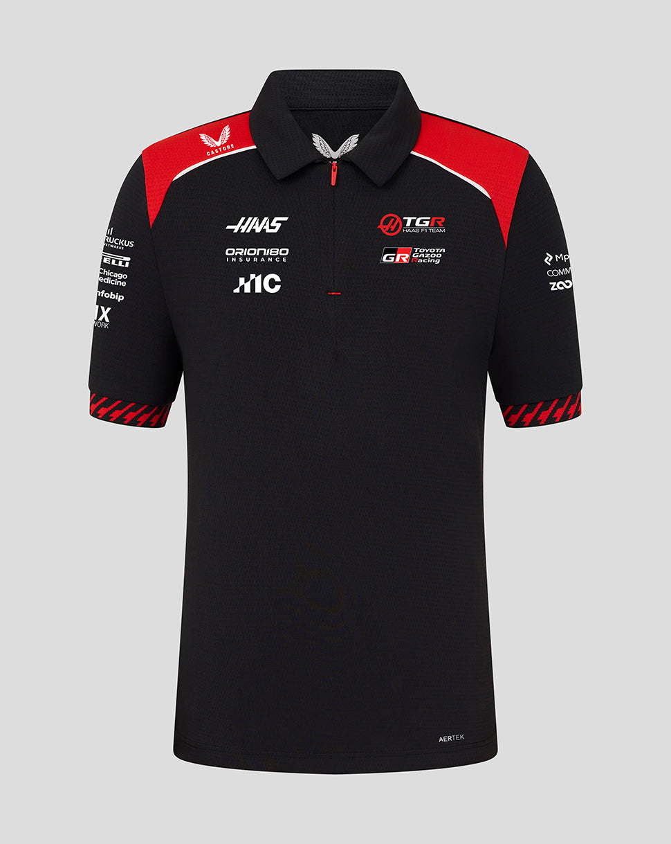 Black polo shirt with red accents and multiple brand logos on a gray background