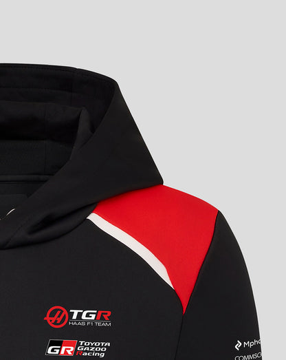 Black hoodie with red and white accents on a gray background