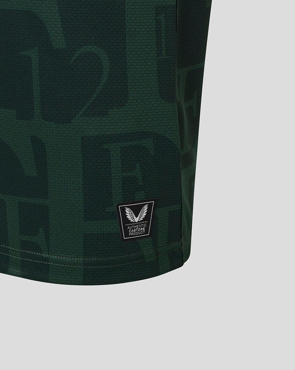 Close-up of the authentic Castore product badge on the lower hem of the Twelfth Shirt.