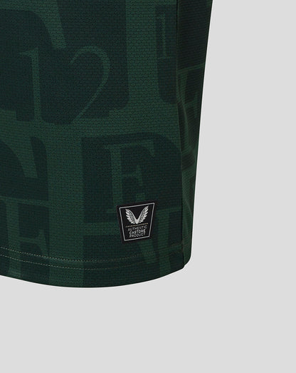 Close-up of the authentic Castore product badge on the lower hem of the Twelfth Shirt.