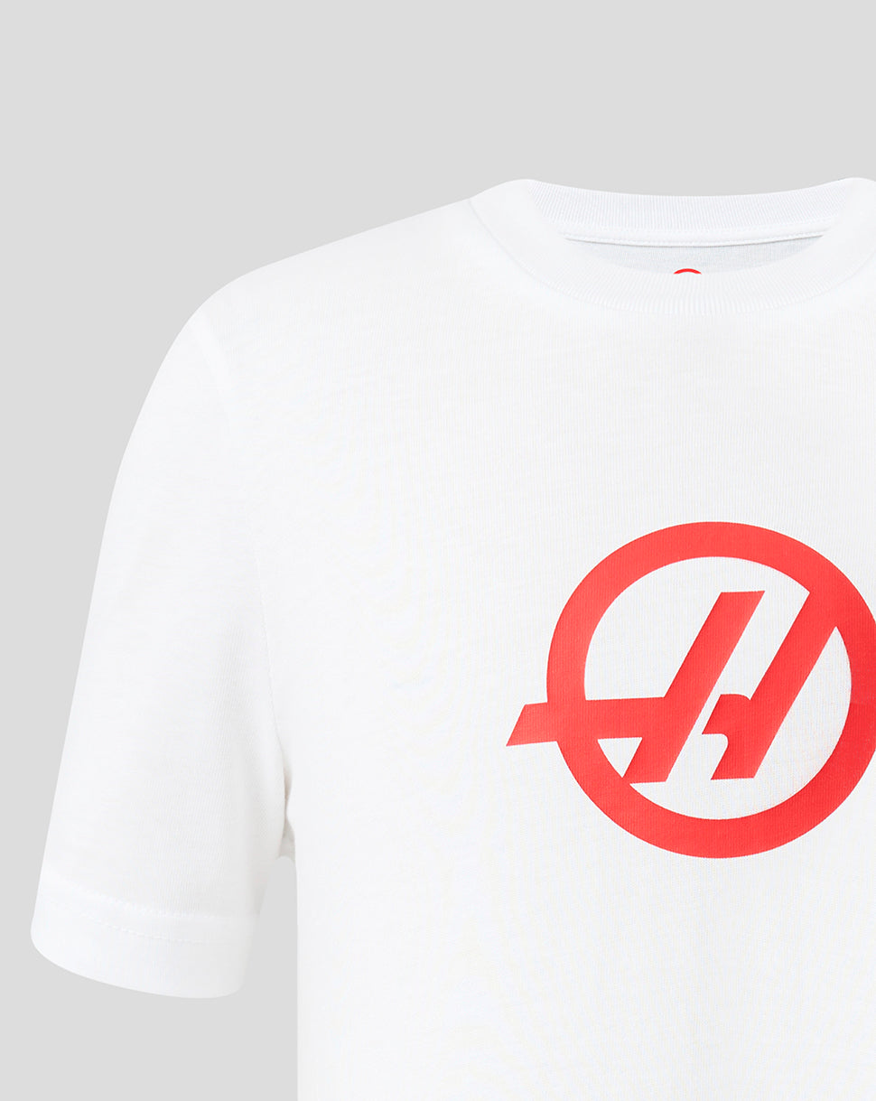 White t-shirt with a red logo on a light gray background