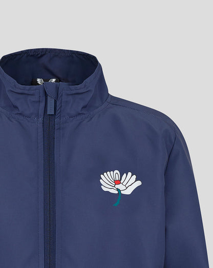 Navy blue jacket with a white logo on a light gray background