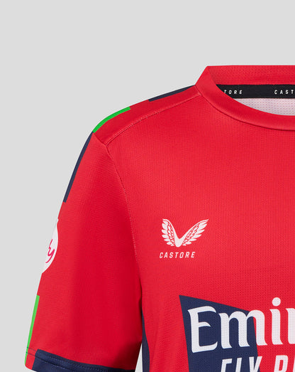 Red sports jersey with Castore and Emirates logos on a gray background