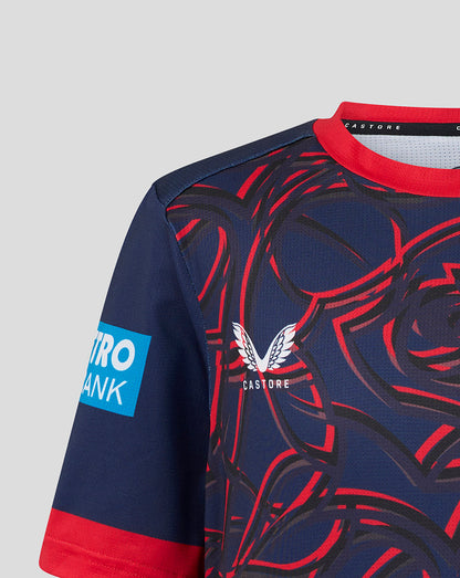 Navy and red sports jersey with branding on a light gray background