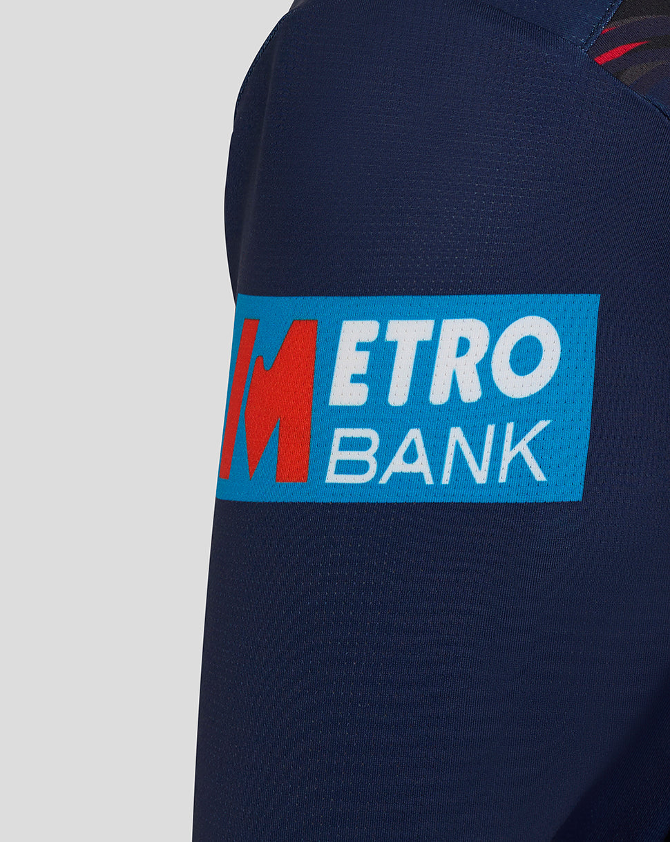 Navy sleeve with Metro Bank logo on a gray background